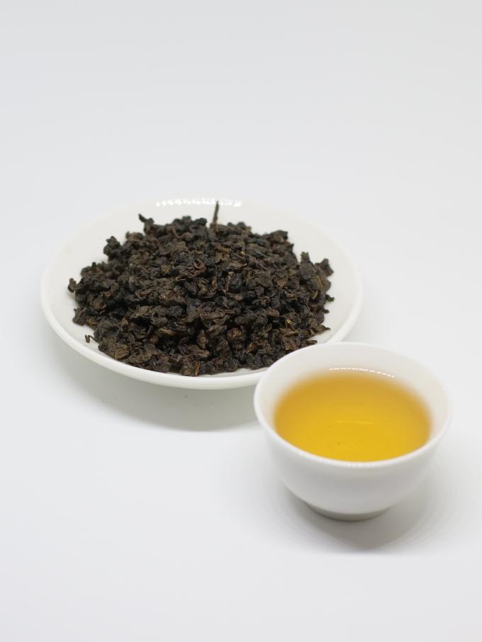 Frühling organische Oolong-Tee-Bindung Guan Yin mit flach gedrückten grünen Teeblättern